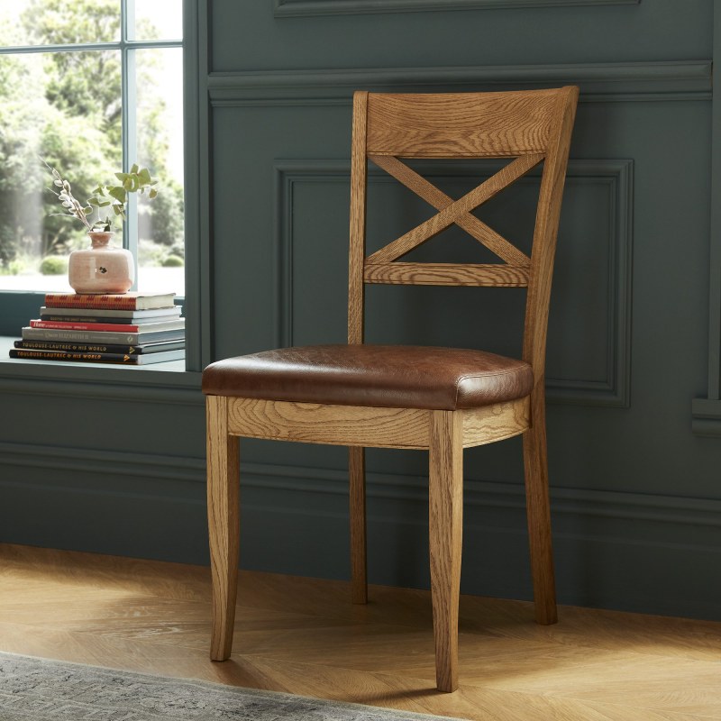 Westbury Rustic Oak X Back Chair - Tan Faux Leather (Pair) Westbury Rustic Oak X Back Chair - Tan Faux Leather (Pair)