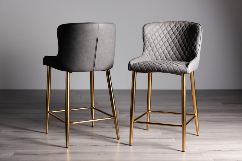 Kent - Dark Grey Faux Leather Bar Stools with Gold Legs (Pair) Kent - Dark Grey Faux Leather Bar Stools with Gold Legs (Pair)