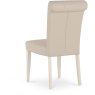 Ashley Antique White Uph Chair - Ivory Bonded Leather (Pair) Ashley Antique White Uph Chair - Ivory Bonded Leather (Pair)